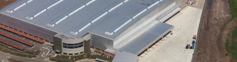 Aerial view of the long roof of a Shoprite Checkers building